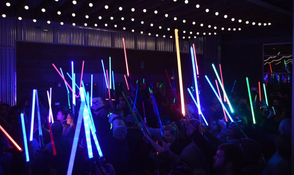 Fisher remembered with poignant lightsaber vigil