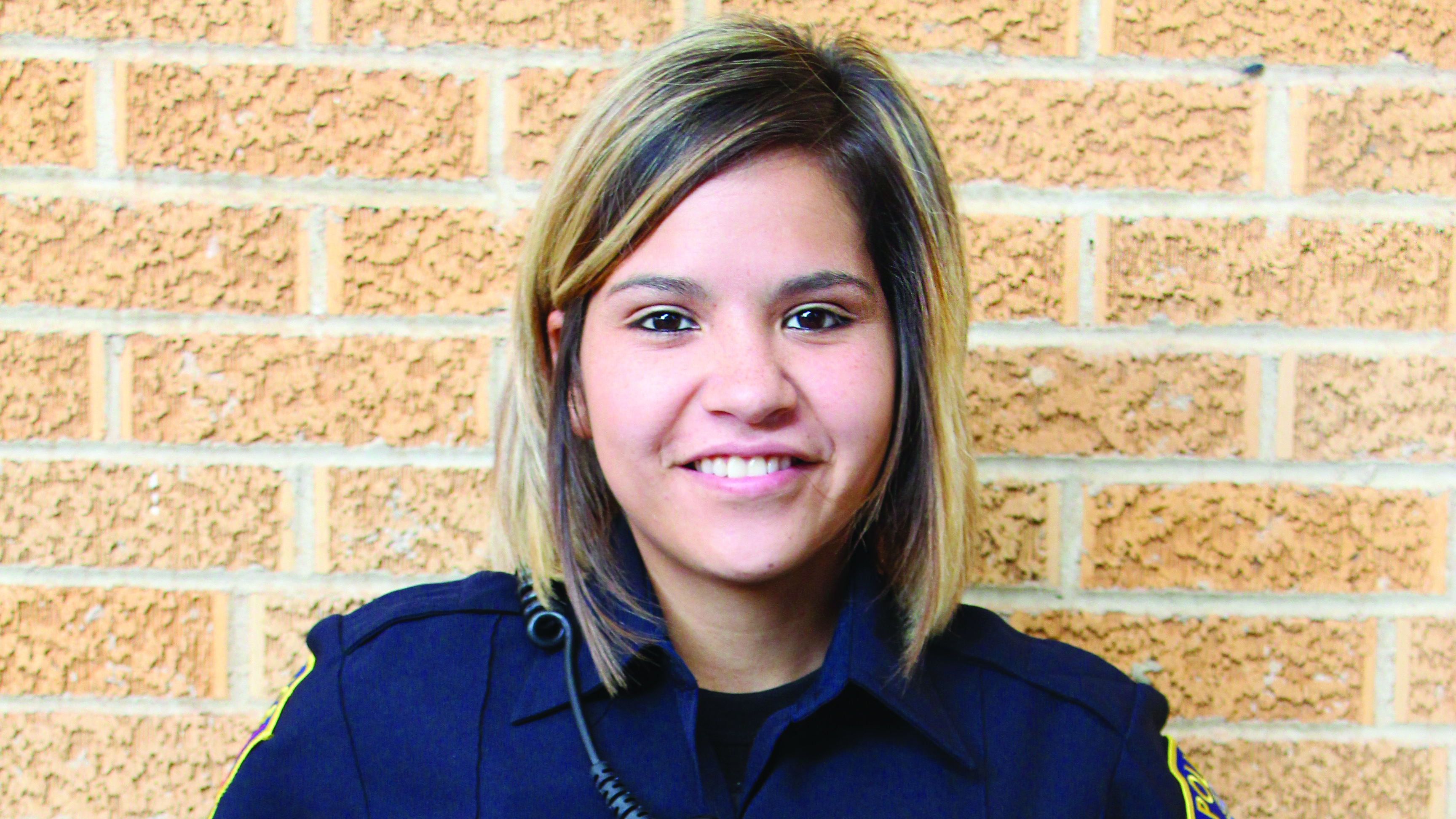 Recent graduate returns to college as campus officer